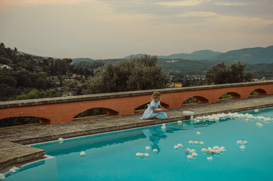 girl by the wedding pool