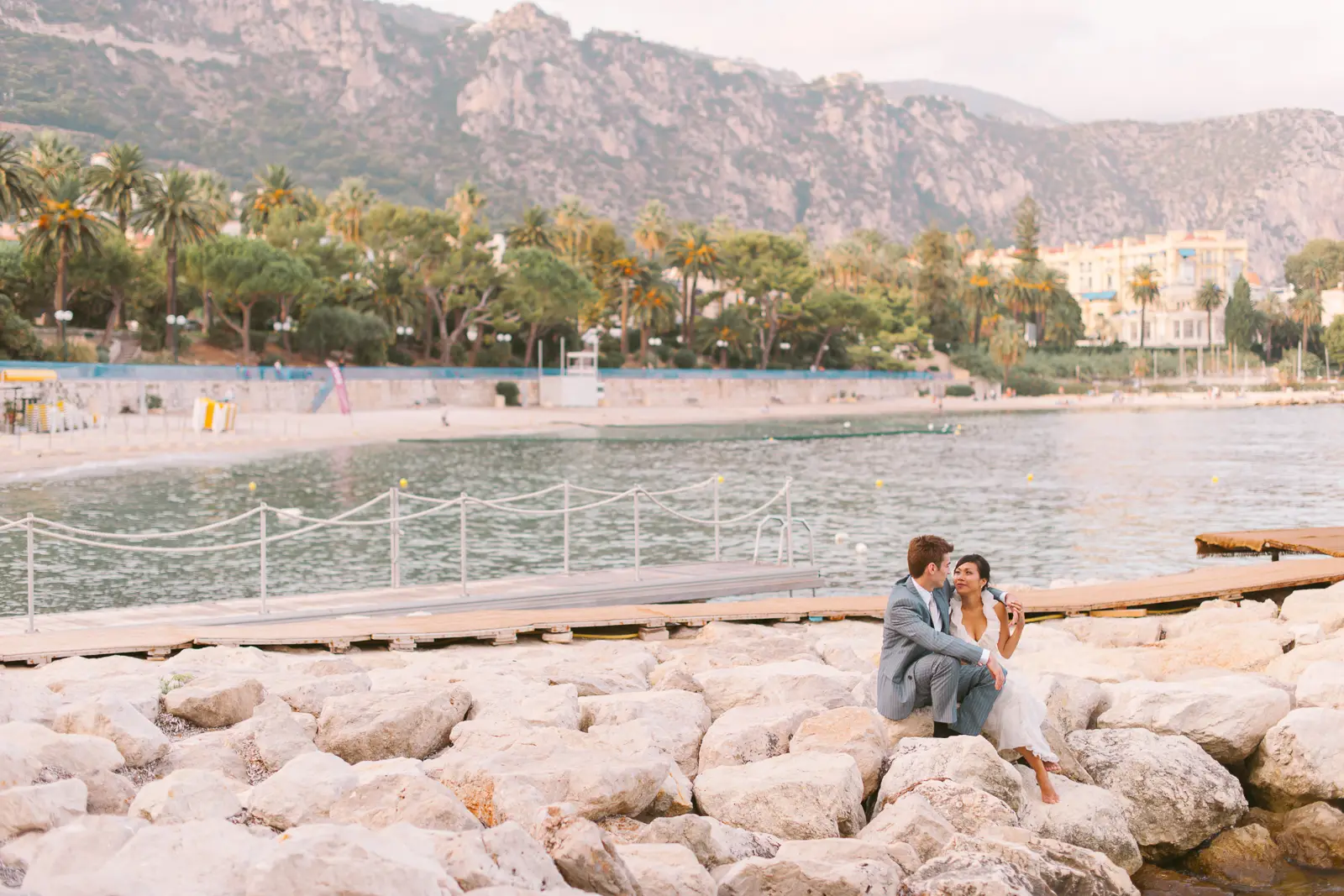 Couple photographed beside the Mediterranean near Beaulieu-sur-Mer on the French Riviera